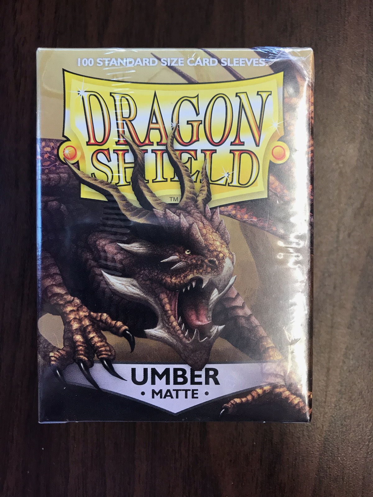 Matte 100 Standard Sized Card Sleeves Umber Dragon Shield 